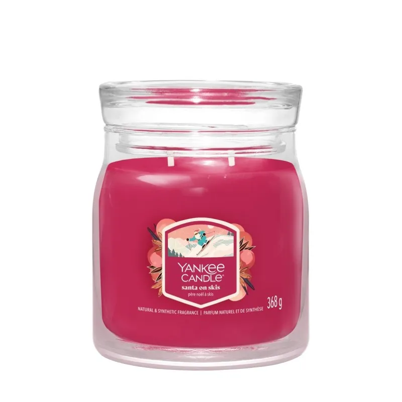 YANKEE CANDLE Santa on Skis – świeca średnia — zdjęcie 1